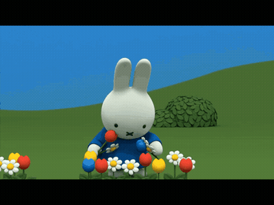 Cartoon Bunny Holding Flowers GIF