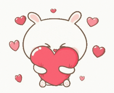 Cartoon Bunny Holding Large Red Heart Surrounded By Hearts GIF