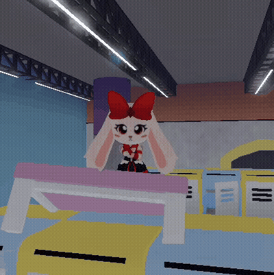 Cartoon Bunny With Red Bow Sitting On Table GIF