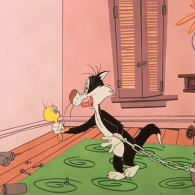 Cartoon Cat Chained To Green Rug GIF