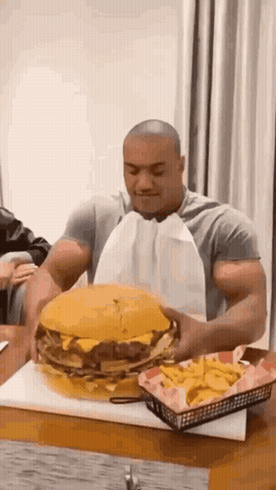 Cartoon Cat Eating Chicken And Hamburger GIF
