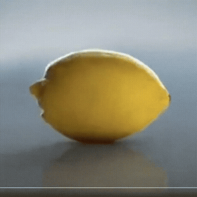 Cartoon Cat Eating Lemon GIF