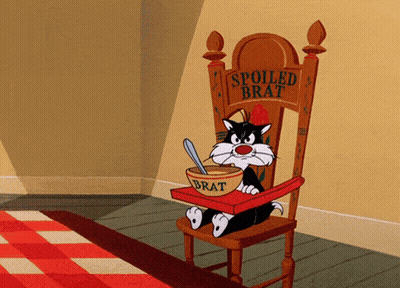 Cartoon Cat In High Chair With Bowl Of Brat GIF