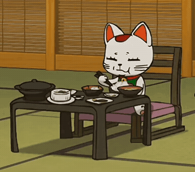 Cartoon Cat Sitting At Table Eating GIF
