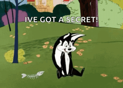 Cartoon Cat Sitting In Grass Saying Ive Got A Secret GIF