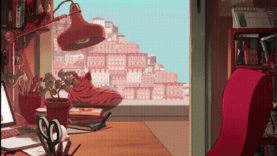 Cartoon Cat Sitting On Desk With Lamp GIF