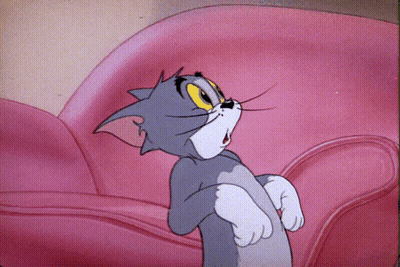 Cartoon Cat Sitting On Pink Chair GIF