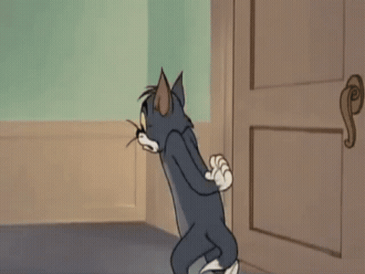 Cartoon Cat Standing In Hallway GIF