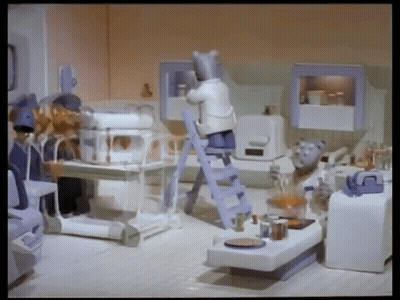 Cartoon Cat Standing On Ladder In Kitchen GIF