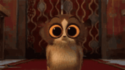 Cartoon Cat With Big Orange Eyes GIF