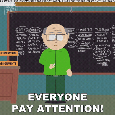 Cartoon Character At Blackboard Saying Everyone Pay Attention GIF