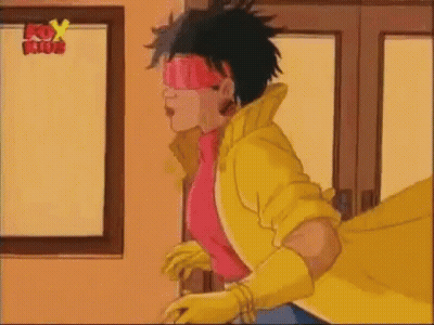 Cartoon Character At Door In Yellow Cape And Gloves GIF