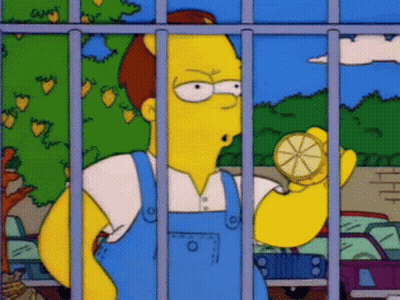 Cartoon Character Behind Bars Holding Lemon GIF