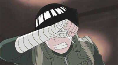 Personaje animado cubriéndose la cara con la mano y sombrero negro GIF