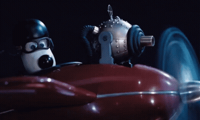 Cartoon Character Driving Red Vehicle GIF