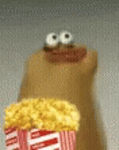 Cartoon Character Eating Popcorn And Donut GIF