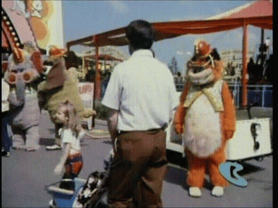 Cartoon Character Flying Over Mountains GIF