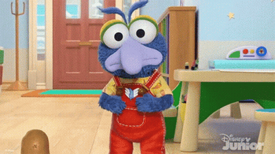 Cartoon Character From Disney Junior Holding Book GIF