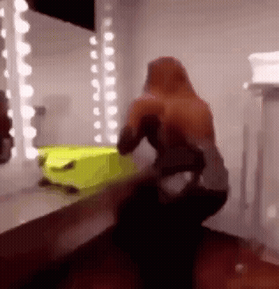 Cartoon Character Holding Baseball Bat At Pentong Pos Ron Building GIF