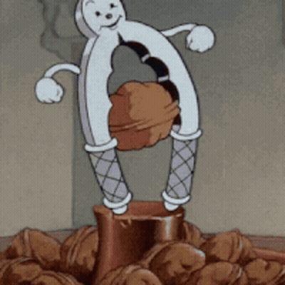 Cartoon Character Holding Nutcracker GIF
