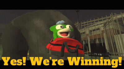 Cartoon Character Holding Red Bag Saying Yes We're Winning GIF