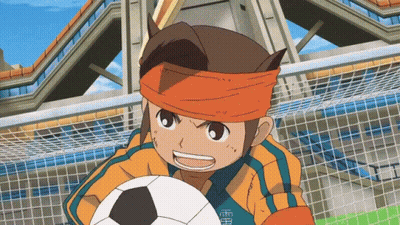 Cartoon Character Holding Soccer Ball With Chinese Characters On Shirt GIF