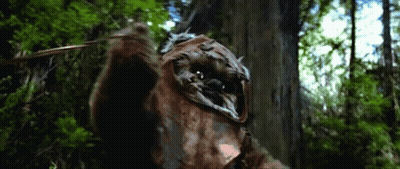 Cartoon Character Holding Sword In Woods GIF