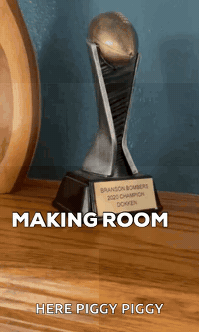 Cartoon Character Holding Two Red Playing Cards By Pile GIF