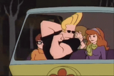 Cartoon Character In Black Shirt And Blue Jeans Pointing GIF