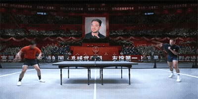 Cartoon Character In Blue Suit With Red X GIF