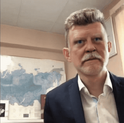 Cartoon Character In Confetti Shower GIF