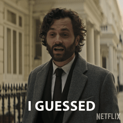 Cartoon Character In Feathered Headdress Smiling Behind Leaves GIF