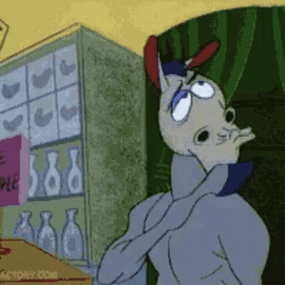 Cartoon Character In Front Of Chicken Shelf GIF