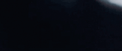 Cartoon Character In Front Of Party Sign GIF