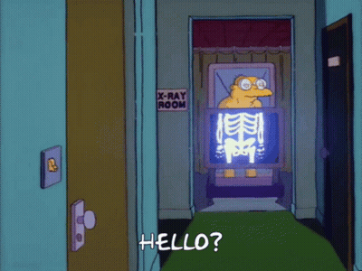 Cartoon Character In Front Of X-Ray Room GIF