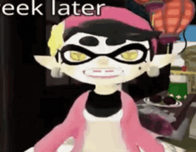 Cartoon Character In Glasses And Pink Hat GIF