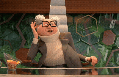 Cartoon Character In Glasses And Turtleneck Sitting GIF
