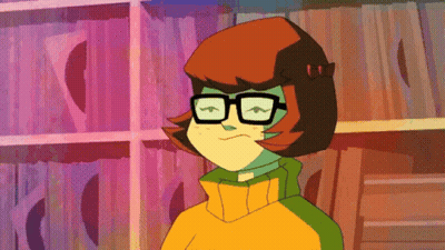 Cartoon Character In Glasses And Yellow Sweater GIF