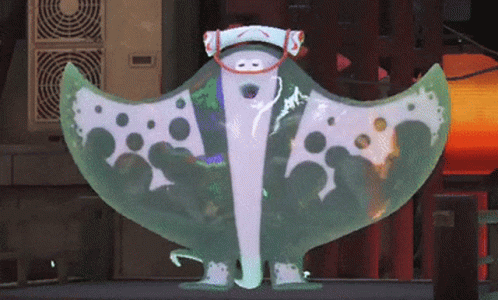 Cartoon Character In Green Cape And White Hat With S GIF
