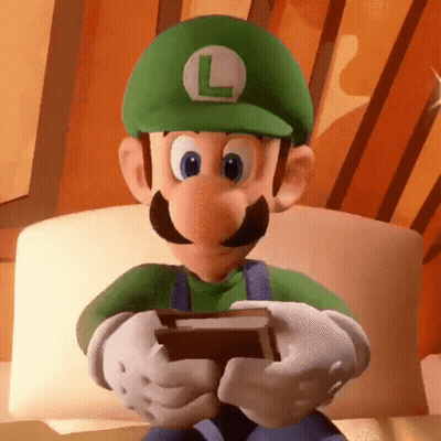 Cartoon Character In Green Hat Holding Book GIF