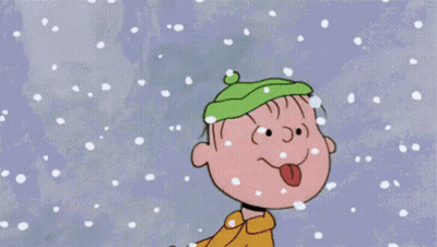 Cartoon Character In Green Hat Sticking Tongue Out In Snow GIF