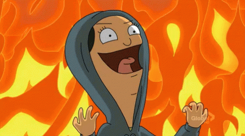 Cartoon Character In Hoodie In Front Of Fire GIF