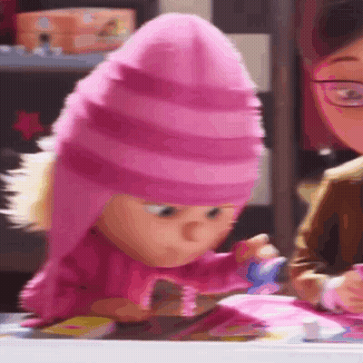 Cartoon Character In Pink Hat Sitting At Table GIF