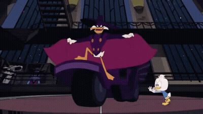 Cartoon Character In Purple Cape Next To Duck On Motorcycle GIF