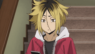 Cartoon Character In Red Jacket And Yellow Hair Looking At Phone GIF
