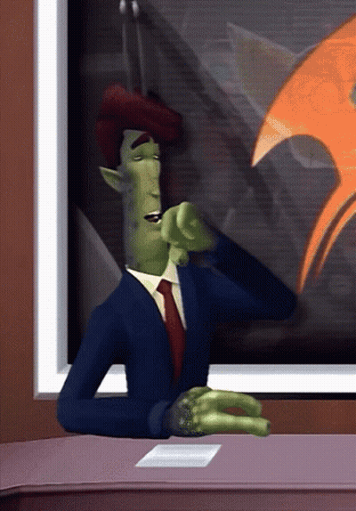 Cartoon Character In Suit And Tie Sitting At Table GIF