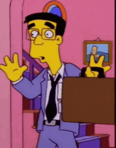 Cartoon Character In Suit Holding Briefcase GIF