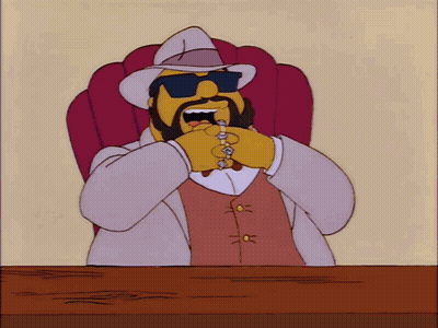 Cartoon Character In Sunglasses And Hat At Desk GIF