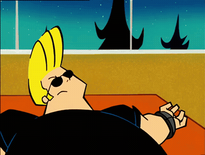 Cartoon Character In Sunglasses Laying On Ground GIF