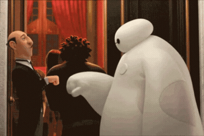 Cartoon Character In Tuxedo Next To White Bear GIF